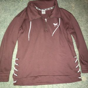 Pink Victoria’s Secret half zip.